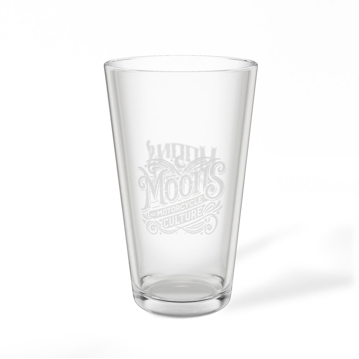Empty MOONSMC The Saloon pint glass showing its engraved logo.
