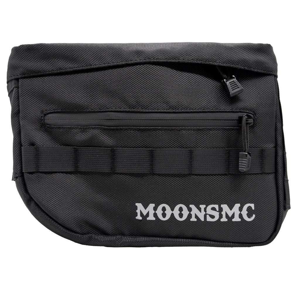 Front view of a black MOONSMC RECON saddlebag with MOLLE webbing and a zippered pocket.