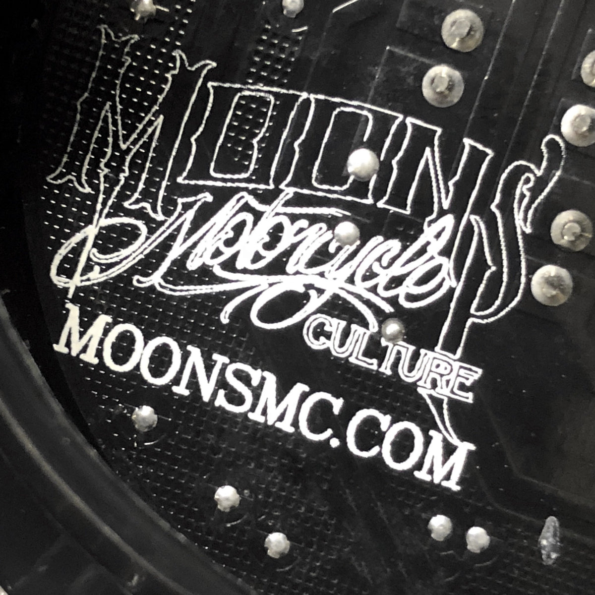 Close-up of MOONSMC branding and LEDs inside the Low Profile V4 tail light.