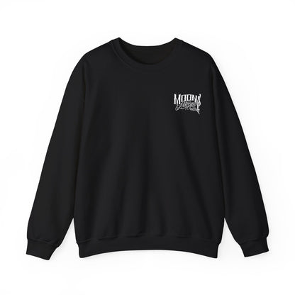 MOONSMC Bad Santa Heavy Blend Crewneck Sweatshirt: front of the black sweatshirt with a small chest logo.