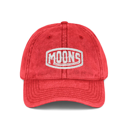 MOONSMC Vintage Badge Embroidered Stone Washed Hat: front of the red washed-finish cap with an embroidered badge.