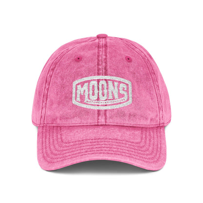 MOONSMC Vintage Badge Embroidered Stone Washed Hat: front of the pink washed-finish cap with an embroidered badge.