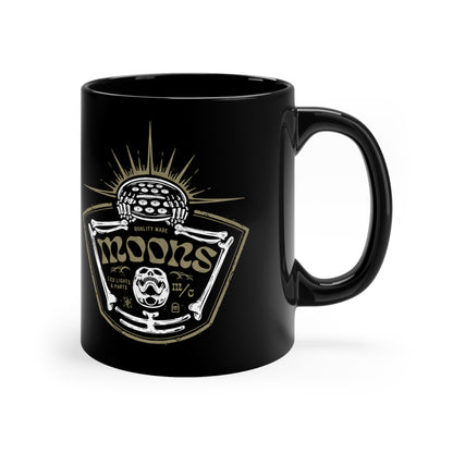 MOONSMC Skeleton - Rise of the Fly Eye 11oz Black Mug: black mug showing the skeleton and headlight graphic, handle on the right.
