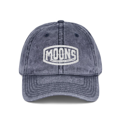 MOONSMC Vintage Badge Embroidered Stone Washed Hat: front of the blue washed-finish cap with an embroidered badge.