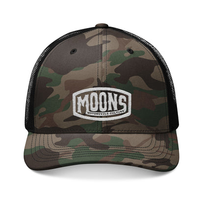 MOONSMC Vintage Badge Embroidered Camouflage Trucker Hat: front view of the green-and-brown camouflage cap with a badge and black mesh.