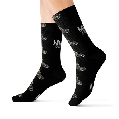 MOONSMC Red Rider FXR Sublimation Socks: black motorcycle-pattern socks shown worn on feet.