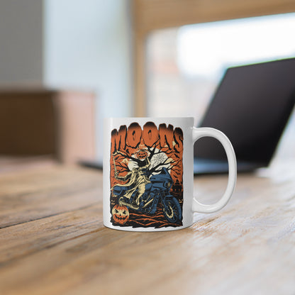 MOONSMC 2024 Halloween Edition - FXLRST Headless Horsemen Graveyard Coffee Mug Orange: printed white mug on a wooden table.