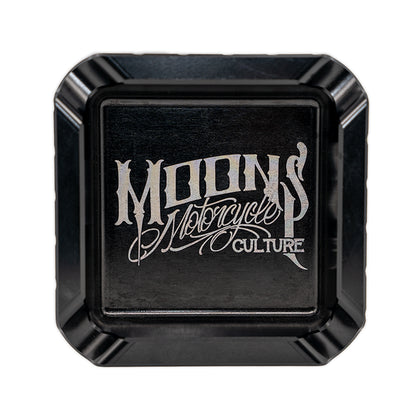 MOONSMC "The Diplomat" Cigar Ashtray: top view in black showing the engraved logo.