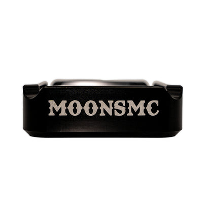 MOONSMC "The Diplomat" Cigar Ashtray: side view of the black tray with MOONSMC lettering.