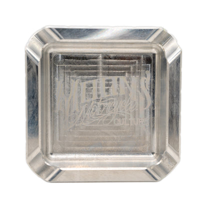 MOONSMC "The Diplomat" Cigar Ashtray: top view in silver showing the engraved logo.