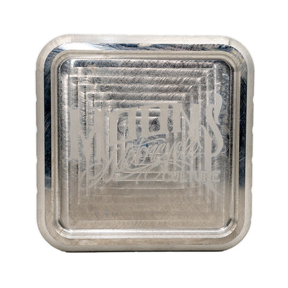 MOONSMC "The Diplomat" Cigar Ashtray: close-up of the engraved logo inside the silver tray.
