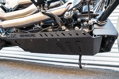 MOONSMC full lower skid plate installed beneath a touring motorcycle engine.