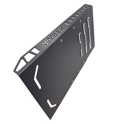 Angled view of the black MOONSMC full lower skid plate for touring motorcycles.