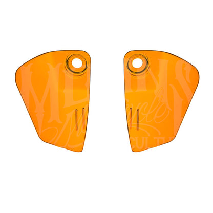 Pair of orange MOONSMC Softail FXLRST fairing air deflectors with circular mounting openings.