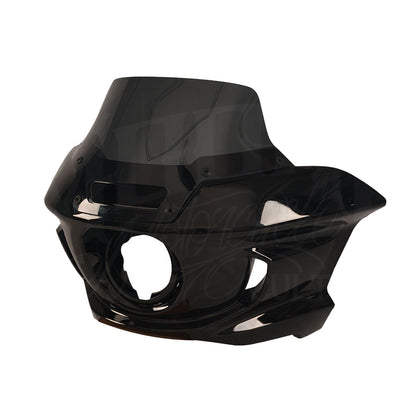 Angled front view of the black MOONSMC FXLRST-style fairing with a tinted windshield.