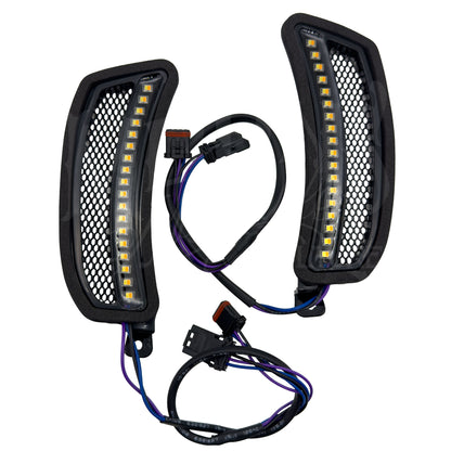 Pair of MOONSMC FXLRST fairing vent LED lights with black mesh inserts and wiring connectors.