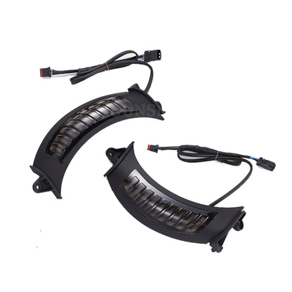 Pair of curved black light housings and wiring connectors shown with the MOONSMC Moonmaker 3 headlight.