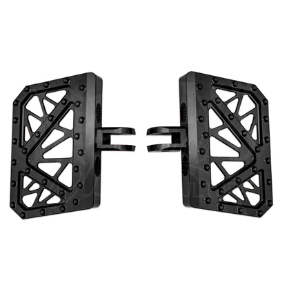Top view of a pair of black MOONSMC Softail M8 mini floorboards with geometric cutouts and traction pins.