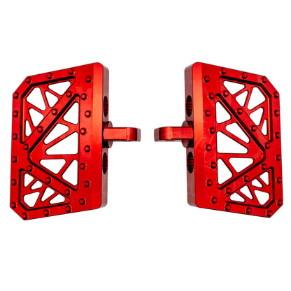 Pair of red MOONSMC mini floorboards for Dyna, FXR and Sportster, showing geometric cutouts and traction pins.