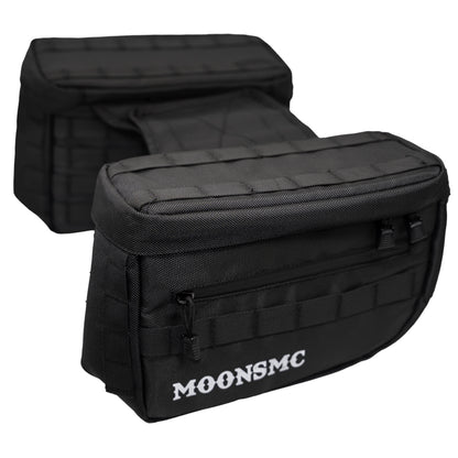 Pair of black MOONSMC RECON saddlebags showing their front pockets and top lids.