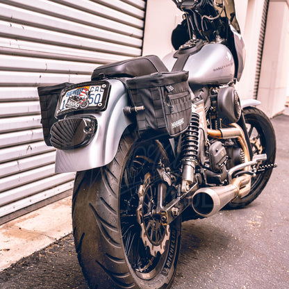 Rear three-quarter view of a motorcycle fitted with MOONSMC RECON saddlebags.