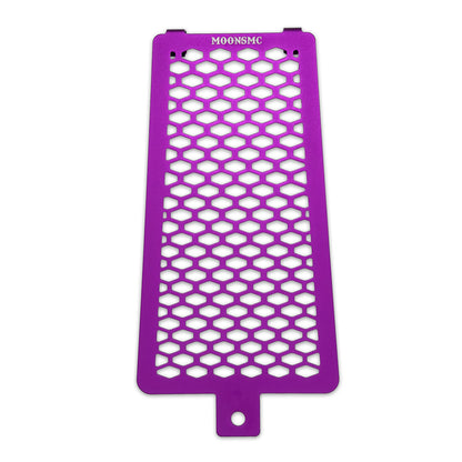 Front view of the purple MOONSMC Softail M8 oil cooler guard with a honeycomb pattern.