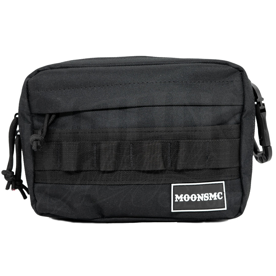 Front view of the black MOONSMC UrbanOps handlebar bag with MOLLE loops and a logo patch.