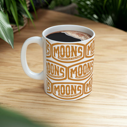 MOONSMC Vintage Badge Ceramic Mug 11oz: printed white mug filled with coffee on a wooden table.
